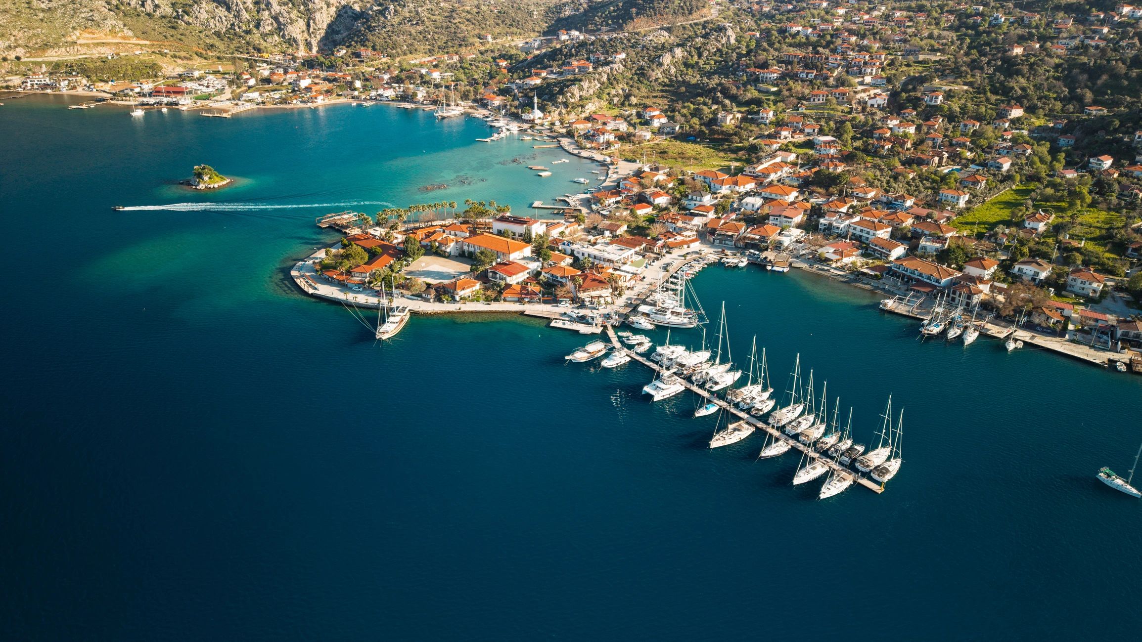 Turquoise coastal waters and rocky island